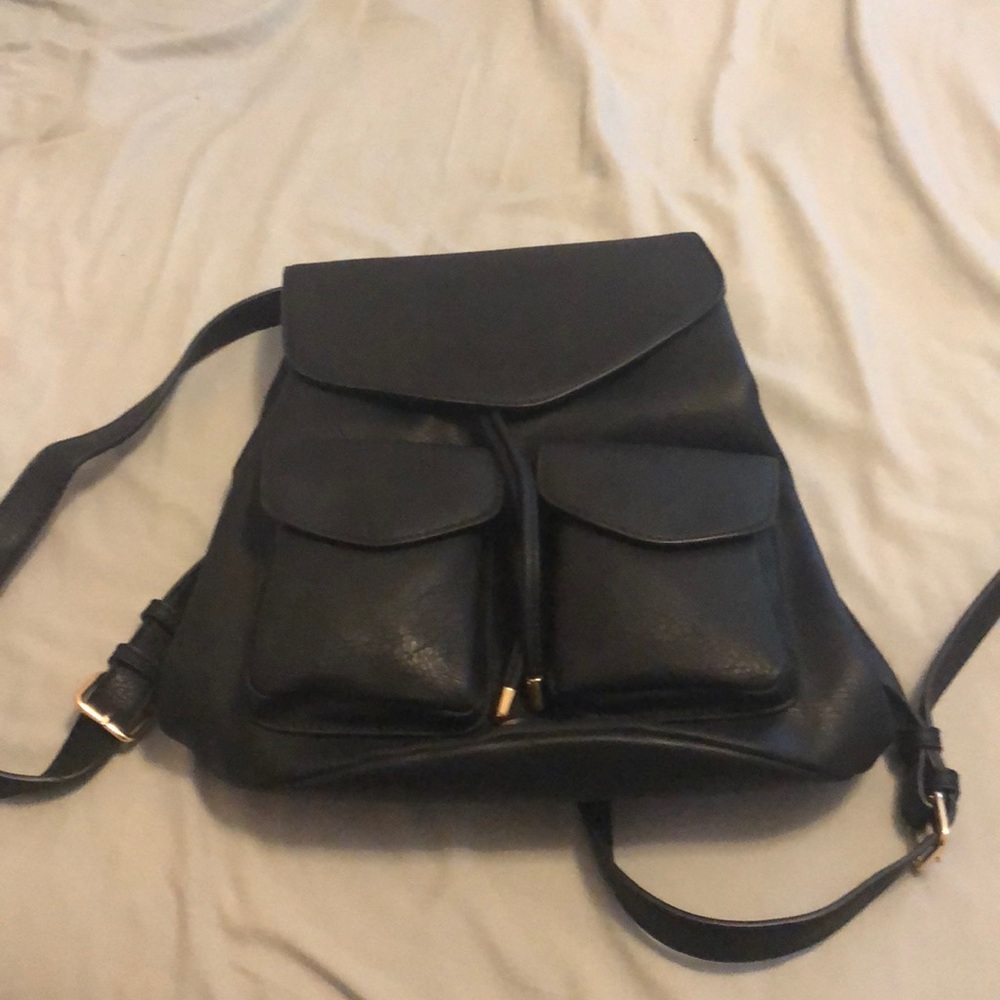 BLACK NEVER USED FAUX LEATHER BACKPACK